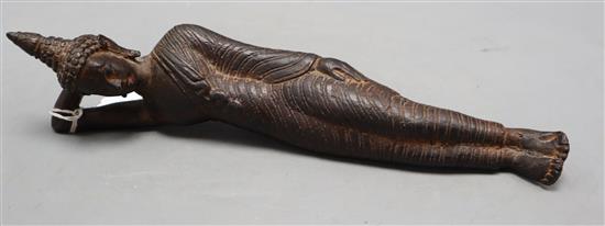 A 19th century Thai bronze reclining Buddha, length 28cm
